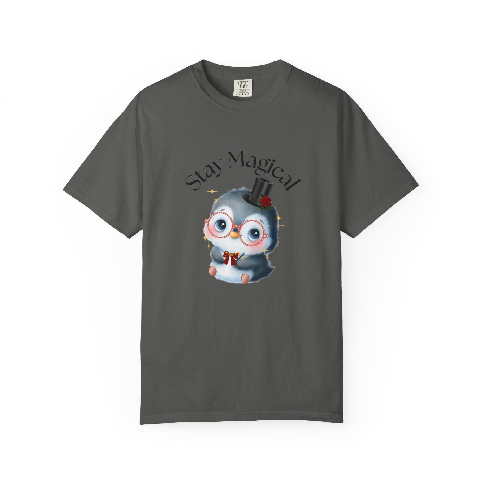 Gray t-shirt with a cartoon penguin wearing a top hat and bow tie, and the text 'Stay Magical' on a white background.