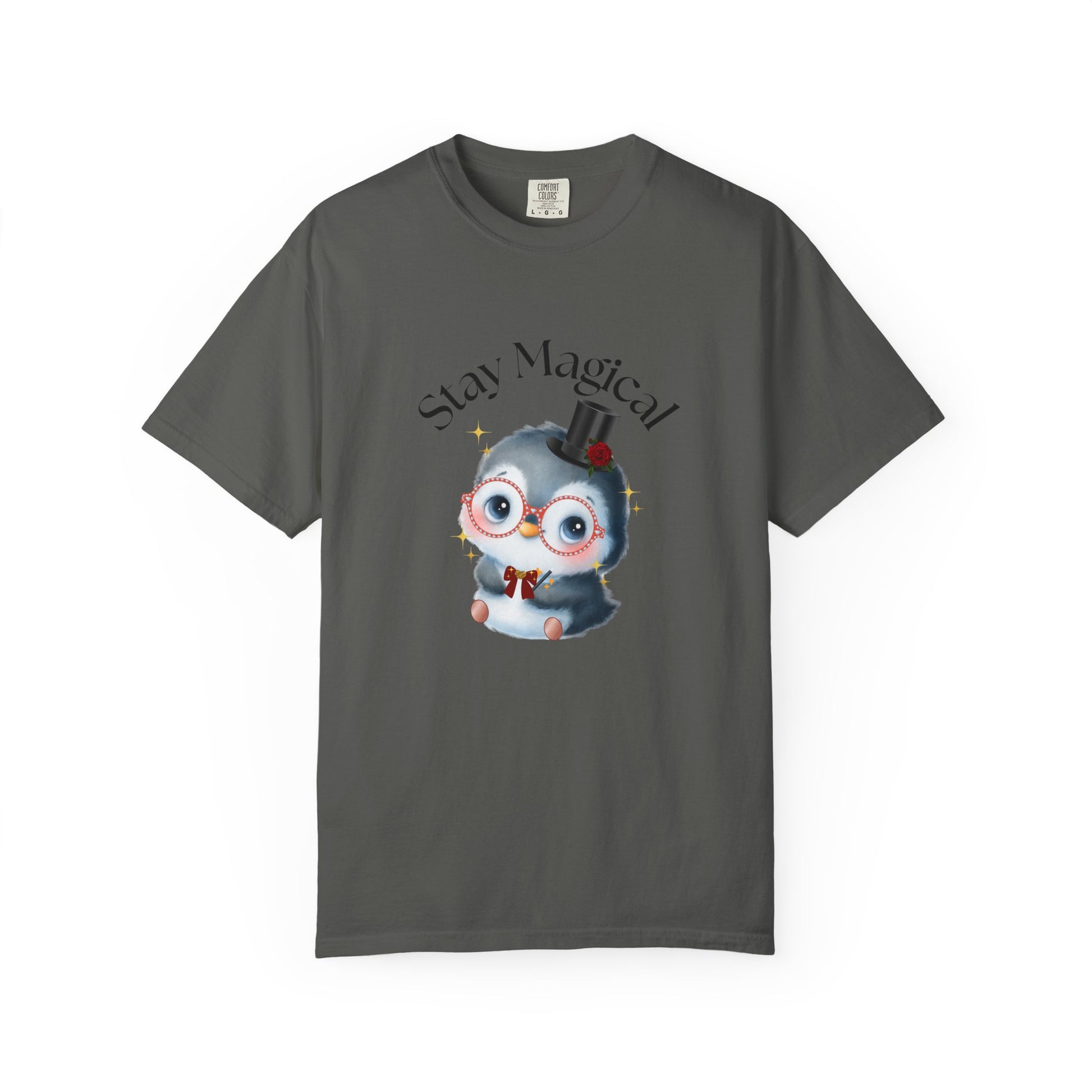Gray t-shirt with a cartoon penguin wearing a top hat and bow tie, and the text 'Stay Magical' on a white background.